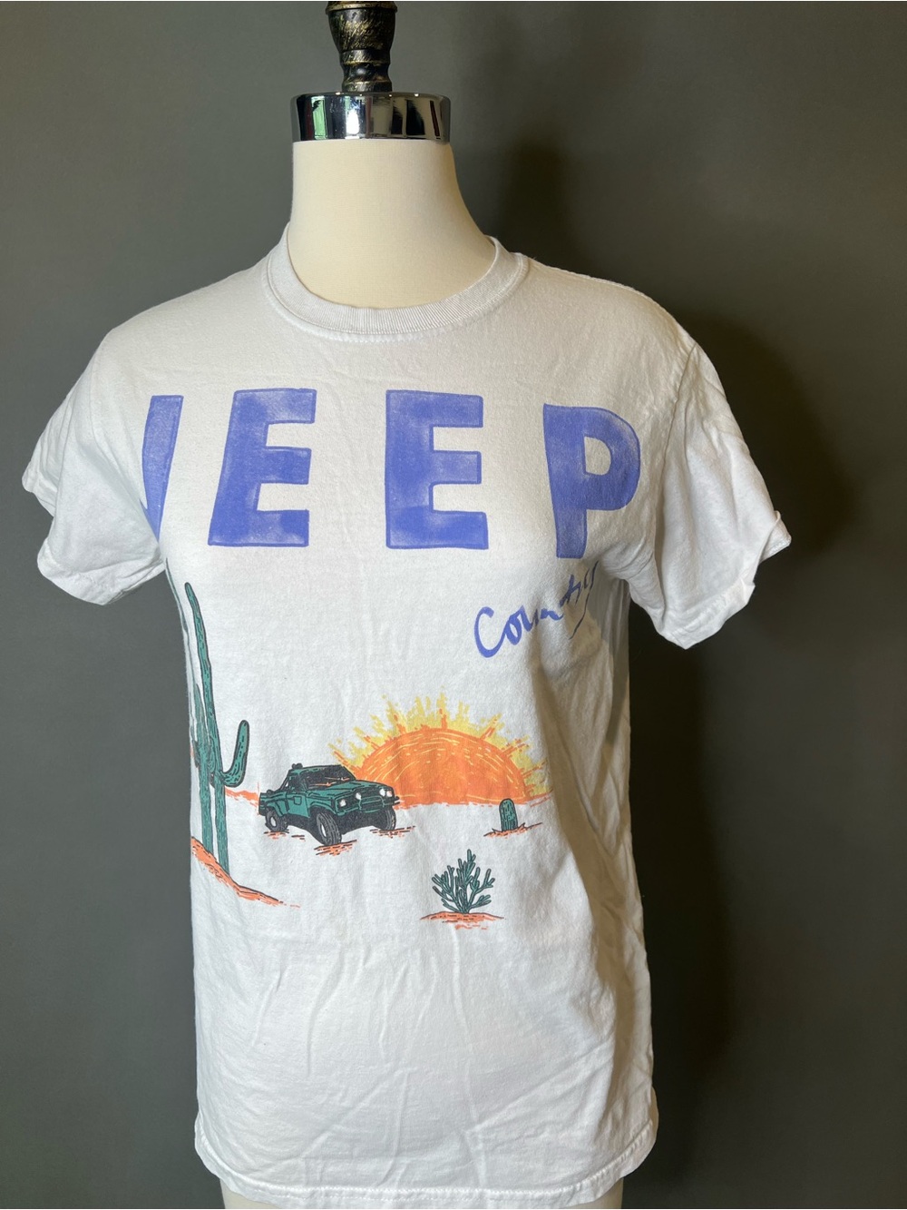Jeep White Tee with Purple Logo and Desert Sunset Graphic